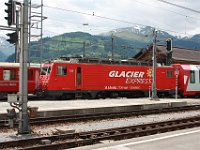 27.06.2015 MGB HGe 4/4 II 106 mit Glacier Express in Disentis